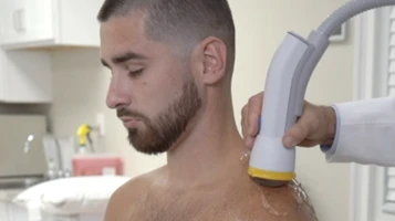 Chiropractic Fort Collins CO SoftWave Therapy On Shoulder Chiropractic Fort Collins CO SoftWave Therapy On Shoulder