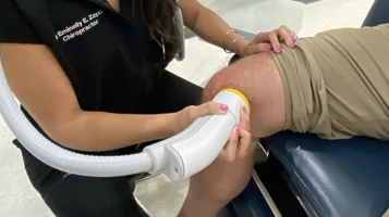 Chiropractic Wellington CO SoftWave Therapy On Knee